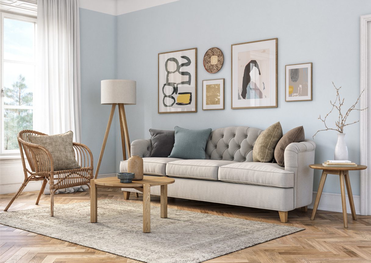 Bohemian living room with a light blue wall