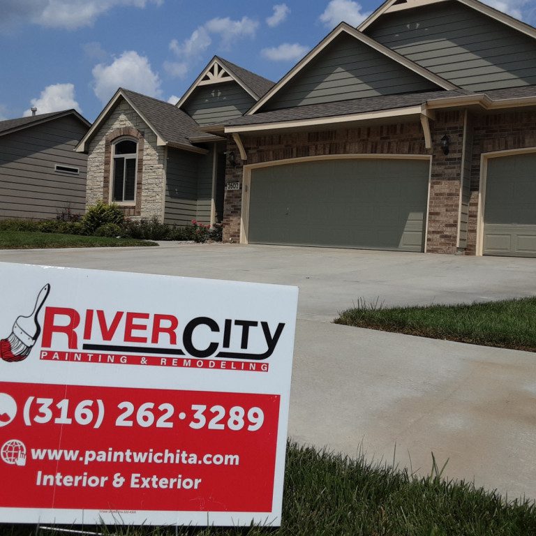River city painting & remodeling lawn sign