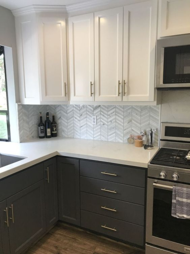 Refinished Contrasting Dark Painted Cabinets on Bottom with Light Cabinets on Top 