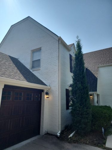white-brick-stained-garage