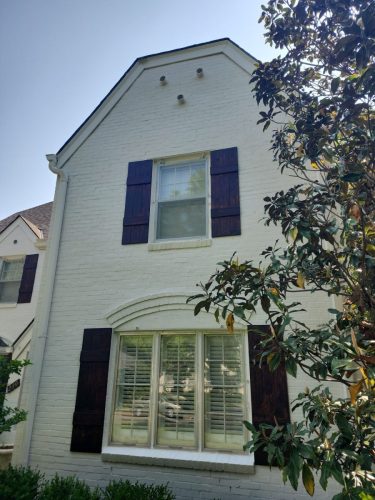 white-brick-stained-shutters